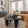 a living room with a couch and coffee table
