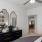 A bedroom with mirrors