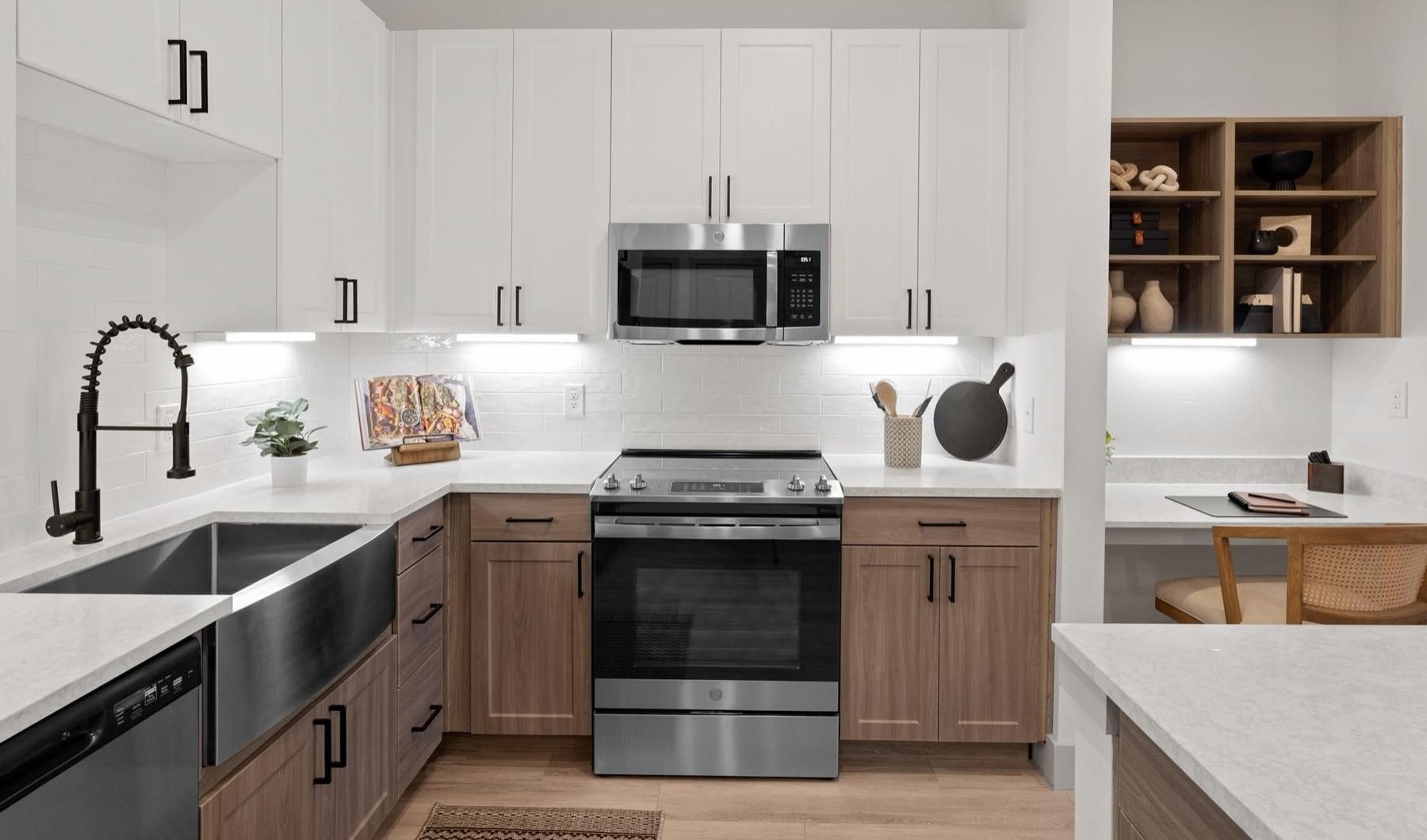 Spacious kitchens with thoughtful details a kitchen with white cabinets