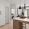 a kitchen with white cabinets